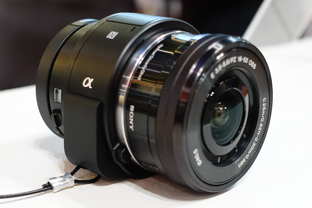  Sony ILCE-QX1 Mirrorless Lens-Style Digital Camera
